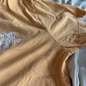 Sporty & Rich Peach-Orange Athletic Club Logo Tee
